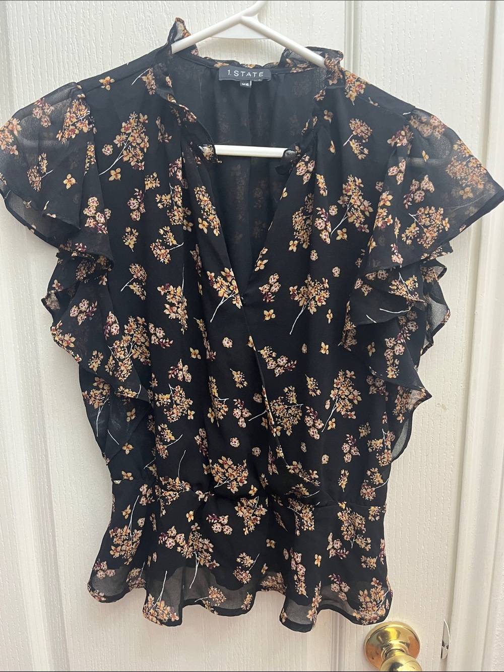 1. State Black Floral Ruffle Wrap Top